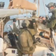 Israeli Soldiers committing illegal piracy against civilian sailing vessel